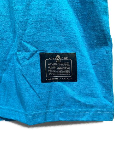 COACH（コーチ）COACH (コーチ) A BATHING APE (ア ベイシング エイプ) REXY TEE ブルー サイズ:XLの古着・服飾アイテム