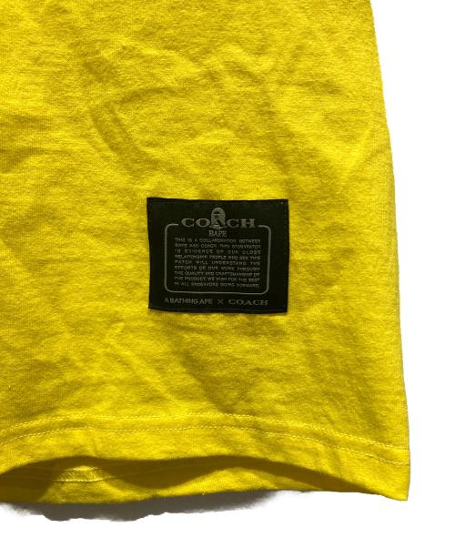 COACH（コーチ）COACH (コーチ) A BATHING APE (ア ベイシング エイプ) REXY TEE イエロー サイズ:XLの古着・服飾アイテム