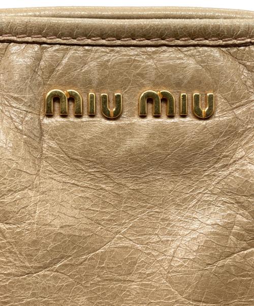 MIU MIU（ミュウミュウ）MIU MIU (ミュウミュウ) レザーハンドバッグ ベージュの古着・服飾アイテム