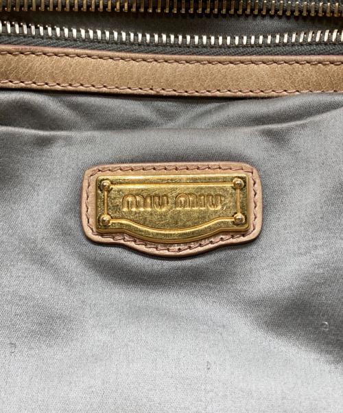 MIU MIU（ミュウミュウ）MIU MIU (ミュウミュウ) レザーハンドバッグ ベージュの古着・服飾アイテム