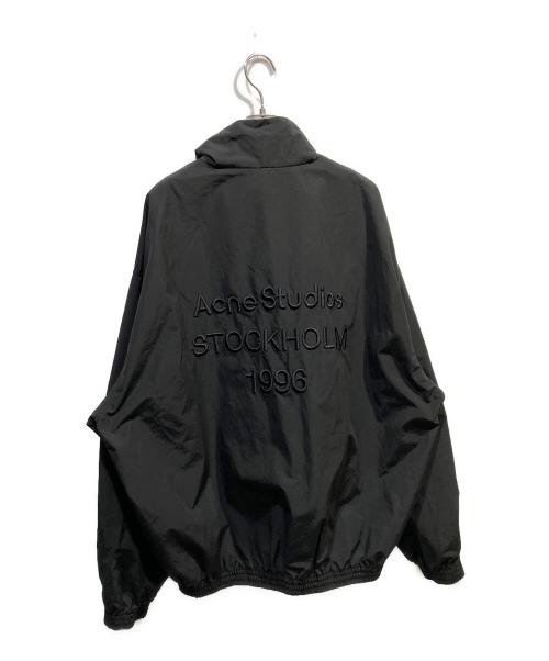 Acne studios（アクネ ストゥディオス）ACNE STUDIOS (アクネ ストゥディオス) ロゴ入りテクニカルジャケット ブラック サイズ:48の古着・服飾アイテム