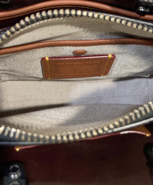 COACH（コーチ）COACH (コーチ) ローグ 20・ヘアカーフ・ゼブラ プリント ブラックの古着・服飾アイテム