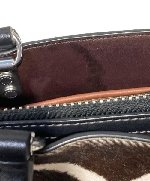 COACH（コーチ）COACH (コーチ) ローグ 20・ヘアカーフ・ゼブラ プリント ブラックの古着・服飾アイテム