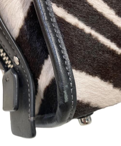 COACH（コーチ）COACH (コーチ) ローグ 20・ヘアカーフ・ゼブラ プリント ブラックの古着・服飾アイテム
