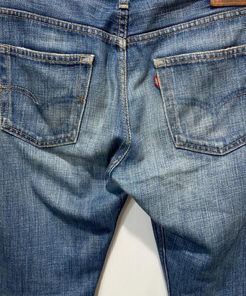 JUNYA WATANABE COMME des GARCONS（(ジュンヤワタナベ コムデギャルソン）JUNYA WATANABE COMME des GARCONS ((ジュンヤワタナベ コムデギャルソン) LEVI'S (リーバイス) 05AW プリントデニムパンツ インディゴ サイズ:Mの古着・服飾アイテム