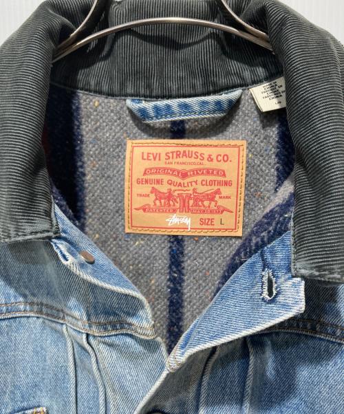 LEVI'S（リーバイス）LEVI'S (リーバイス) stussy (ステューシー) Embossed Trucker Jacket インディゴ サイズ:Lの古着・服飾アイテム