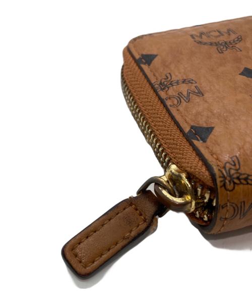 MCM（エムシーエム）MCM (エムシーエム) ラウンドファスナーコンパクト ブラウンの古着・服飾アイテム