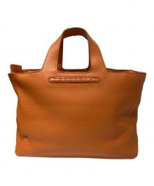 BOTTEGA VENETA（ボッテガベネタ）の古着「イントレチャートラインレザーハンドバッグ」｜オレンジ