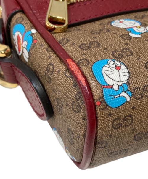 GUCCI（グッチ）GUCCI (グッチ) ドラえもん (ドラエモン) GGスプリーム ショルダーバッグ ブラウン×レッドの古着・服飾アイテム
