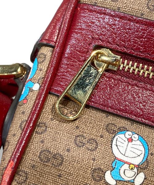 GUCCI（グッチ）GUCCI (グッチ) ドラえもん (ドラエモン) GGスプリーム ショルダーバッグ ブラウン×レッドの古着・服飾アイテム