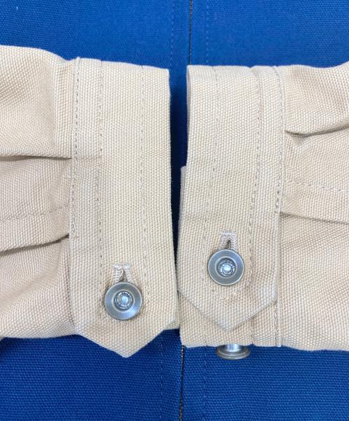 印（イン）印 (イン) バイカラースウィングトップ ベージュ×ネイビー サイズ:Mの古着・服飾アイテム