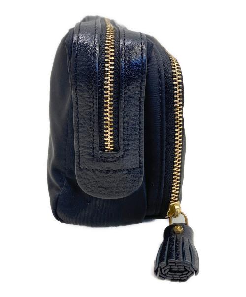 ANYA HINDMARCH（アニヤ・ハインドマーチ）ANYA HINDMARCH (アニヤ・ハインドマーチ) コスメポーチ ブラックの古着・服飾アイテム