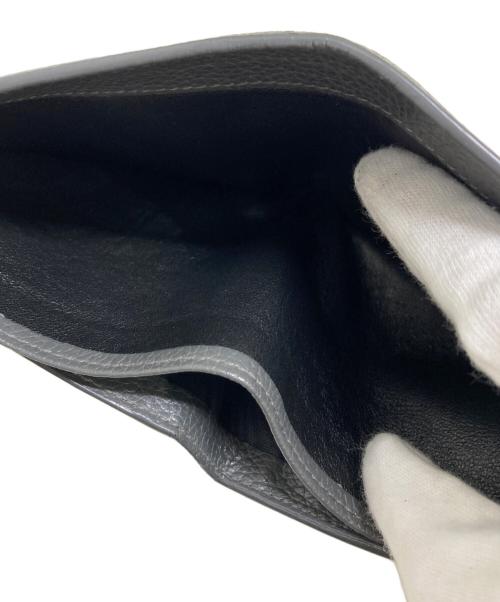 Yves Saint Laurent（イヴサンローラン）Yves Saint Laurent (イヴサンローラン) 2つ折り財布 グレーの古着・服飾アイテム