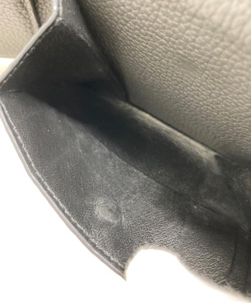 Yves Saint Laurent（イヴサンローラン）Yves Saint Laurent (イヴサンローラン) 2つ折り財布 グレーの古着・服飾アイテム