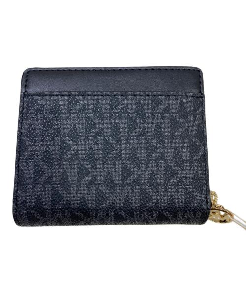 MICHAEL KORS（マイケル・コース）MICHAEL KORS (マイケル・コース) 総柄2つ折り財布 グレーの古着・服飾アイテム