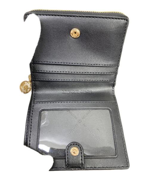 MICHAEL KORS（マイケル・コース）MICHAEL KORS (マイケル・コース) 総柄2つ折り財布 グレーの古着・服飾アイテム