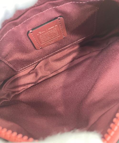 COACH（コーチ）COACH (コーチ) Disney (ディズニー) ボディーバッグ ピンクの古着・服飾アイテム