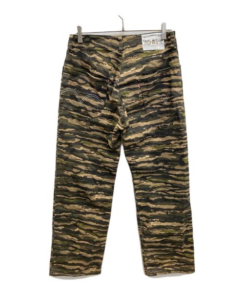 COMME des GARCONS JUNYA WATANABE MAN（コム デ ギャルソン ジュンヤ ワタナベ マン）COMME des GARCONS JUNYA WATANABE MAN (コム デ ギャルソン ジュンヤ ワタナベ マン) LEVI'S (リーバイス) タイガーカモデニムパンツ カーキ サイズ:Mの古着・服飾アイテム