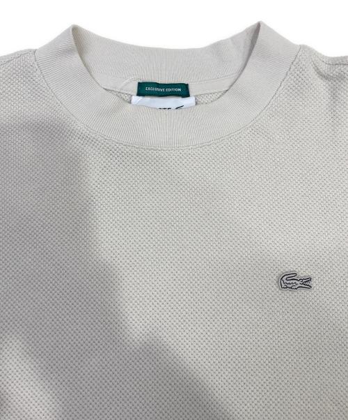 LACOSTE（ラコステ）LACOSTE (ラコステ) URBAN RESEARCH DOORS (アーバンリサーチドアーズ) スウェット アイボリー サイズ:2 未使用品の古着・服飾アイテム