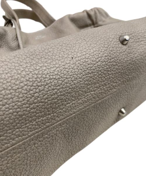 M.U.L（エムユーエル）M.U.L (エムユーエル) シボ型押しベントトート ベージュの古着・服飾アイテム