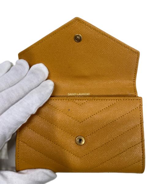Saint Laurent Paris（サンローランパリ）Saint Laurent Paris (サンローランパリ) カサンドラ スモール エンベロープウォレット イエローの古着・服飾アイテム