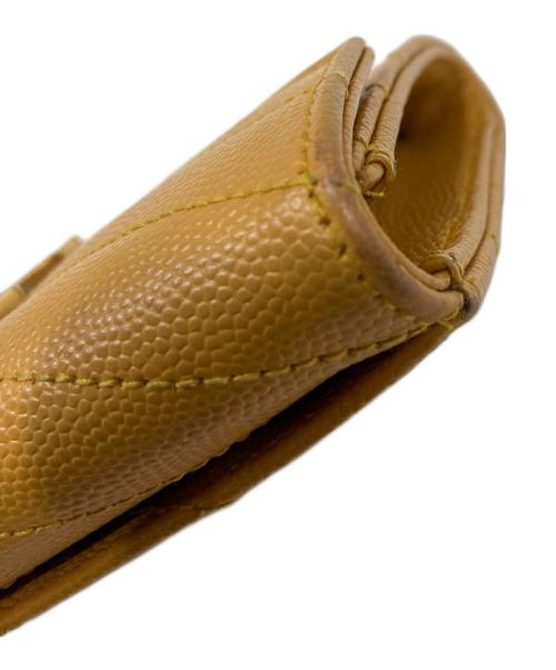 Saint Laurent Paris（サンローランパリ）Saint Laurent Paris (サンローランパリ) カサンドラ スモール エンベロープウォレット イエローの古着・服飾アイテム