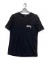 stussy（ステューシー）の古着「プリントTシャツ」｜ブラック