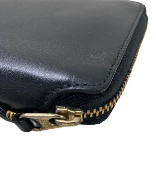 COMME des GARCONS（コムデギャルソン）COMME des GARCONS (コムデギャルソン) ラウンドジップウォレット ブラックの古着・服飾アイテム