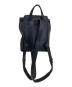 FURLA (フルラ) ダナエ レザー スモールフラップバックパック ブラック：12000円