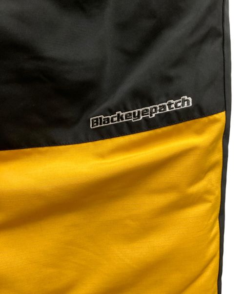 BlackEyePatch（ブラックアイパッチ）BlackEyePatch (ブラックアイパッチ) 2 TONE NYLON PUFFER PANTS イエロー×ブラック サイズ:Ⅿの古着・服飾アイテム