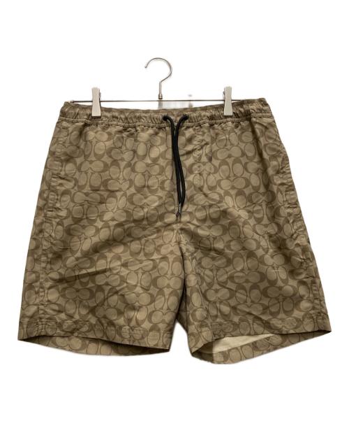 COACH（コーチ）COACH (コーチ) フェイデッド ブルー シグネチャー スイム トランクス ベージュ サイズ:Mの古着・服飾アイテム
