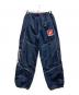 SUPREME（シュプリーム）の古着「Reflective Piping Track Pant」｜ネイビー