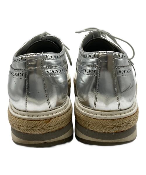 PRADA（プラダ）PRADA (プラダ) エスパドリーユウイングチップシューズ シルバー サイズ:7の古着・服飾アイテム