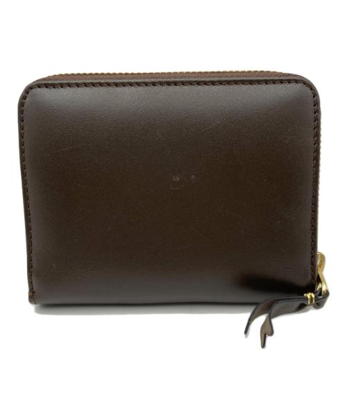 COMME des GARCONS（コムデギャルソン）COMME des GARCONS (コムデギャルソン) ラウンドジップウォレット ブラウンの古着・服飾アイテム