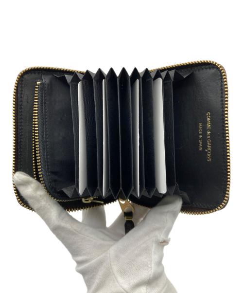 COMME des GARCONS（コムデギャルソン）COMME des GARCONS (コムデギャルソン) ラウンドジップウォレット ブラウンの古着・服飾アイテム