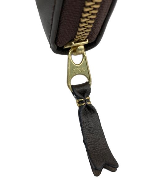 COMME des GARCONS（コムデギャルソン）COMME des GARCONS (コムデギャルソン) ラウンドジップウォレット ブラウンの古着・服飾アイテム