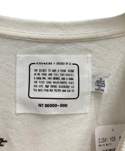 COACH（コーチ）COACH (コーチ) OBSERVED BY US ヴィンテージモチーフTee ホワイト サイズ:Ⅿの古着・服飾アイテム
