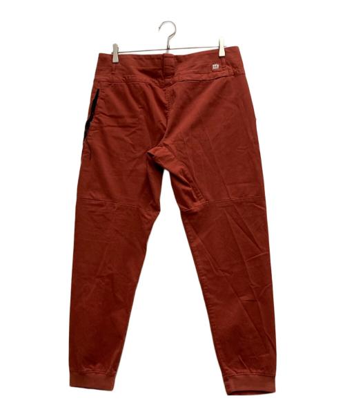 C.P COMPANY（シーピーカンパニー）C.P COMPANY (シーピーカンパニー) Lens Pocket Cargo Pants オレンジ サイズ:48の古着・服飾アイテム