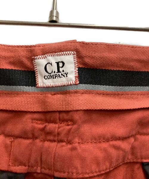 C.P COMPANY（シーピーカンパニー）C.P COMPANY (シーピーカンパニー) Lens Pocket Cargo Pants オレンジ サイズ:48の古着・服飾アイテム