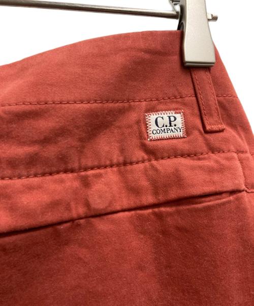 C.P COMPANY（シーピーカンパニー）C.P COMPANY (シーピーカンパニー) Lens Pocket Cargo Pants オレンジ サイズ:48の古着・服飾アイテム