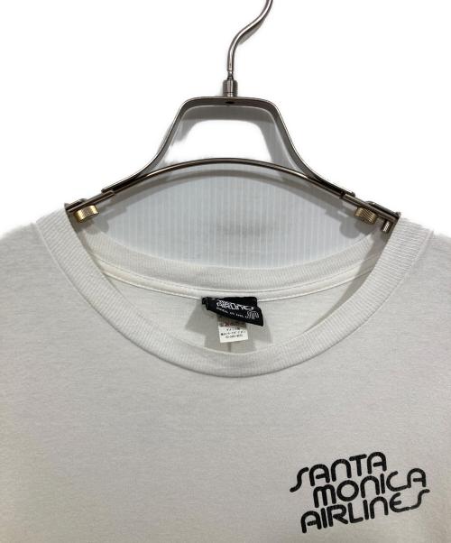 SANTA MONICA AIRLINE（サンタモニカエアライン）SANTA MONICA AIRLINE (サンタモニカエアライン) SMA ロゴＴシャツ ホワイト サイズ:Mの古着・服飾アイテム