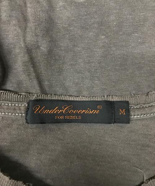 UNDERCOVERISM（アンダーカバーイズム）UNDERCOVERISM (アンダーカバーイズム) COMME des GARCONS (コムデギャルソン) GIZ柄ダメージ加工Tシャツ グレー サイズ:Mの古着・服飾アイテム