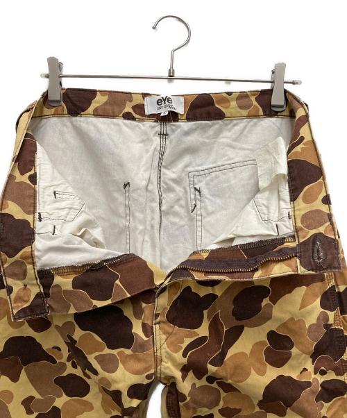 eYe COMME des GARCONS JUNYAWATANABE MAN（アイ コム デ ギャルソン ジュンヤ ワタナベ マン）eYe COMME des GARCONS JUNYAWATANABE MAN (アイ コム デ ギャルソン ジュンヤ ワタナベ マン) Dickies (ディッキーズ) カモフラワークパンツ イエロー×ブラウン サイズ:Lの古着・服飾アイテム
