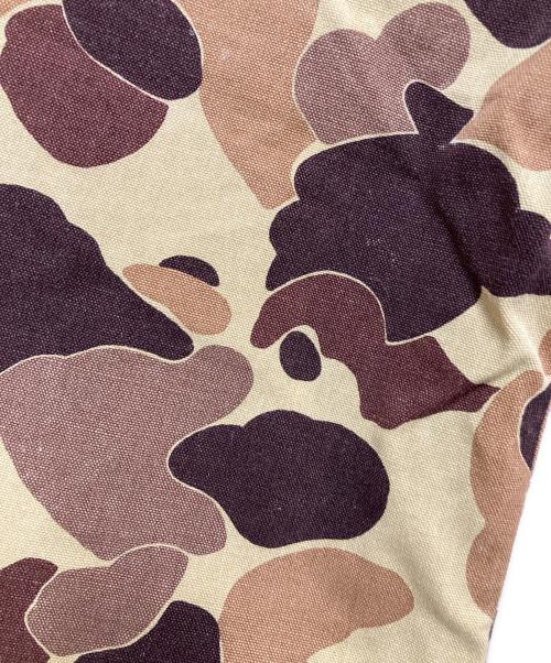 eYe COMME des GARCONS JUNYAWATANABE MAN（アイ コム デ ギャルソン ジュンヤ ワタナベ マン）eYe COMME des GARCONS JUNYAWATANABE MAN (アイ コム デ ギャルソン ジュンヤ ワタナベ マン) Dickies (ディッキーズ) カモフラワークパンツ イエロー×ブラウン サイズ:Lの古着・服飾アイテム