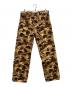 eYe COMME des GARCONS JUNYAWATANABE MAN（アイ コム デ ギャルソン ジュンヤ ワタナベ マン）の古着「カモフラワークパンツ」｜イエロー×ブラウン