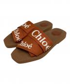 Chloeクロエ）の古着「ロゴフラットサンダル」｜オレンジ