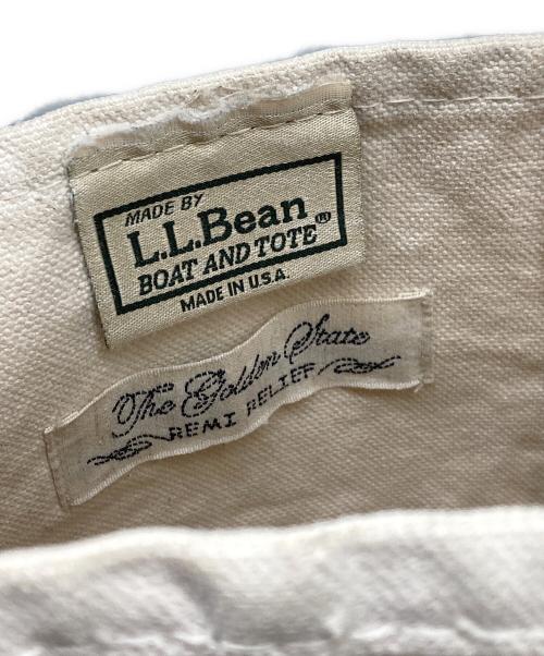 L.L.Bean（エルエルビーン）L.L.Bean (エルエルビーン) REMI RELIEF (レミレリーフ) ダメージ加工ミニトートバッグ ホワイト×ネイビーの古着・服飾アイテム