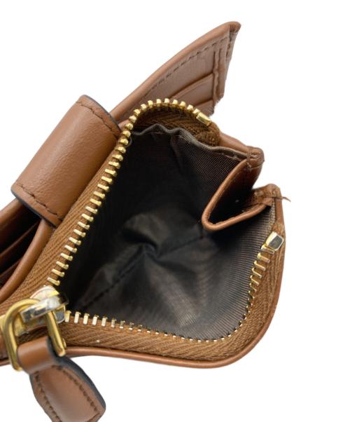 PRADA（プラダ）PRADA (プラダ) シティカーフコンパクトウォレット ブラウンの古着・服飾アイテム