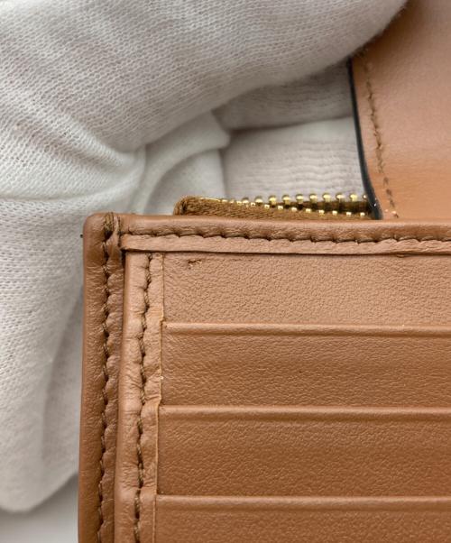 PRADA（プラダ）PRADA (プラダ) シティカーフコンパクトウォレット ブラウンの古着・服飾アイテム