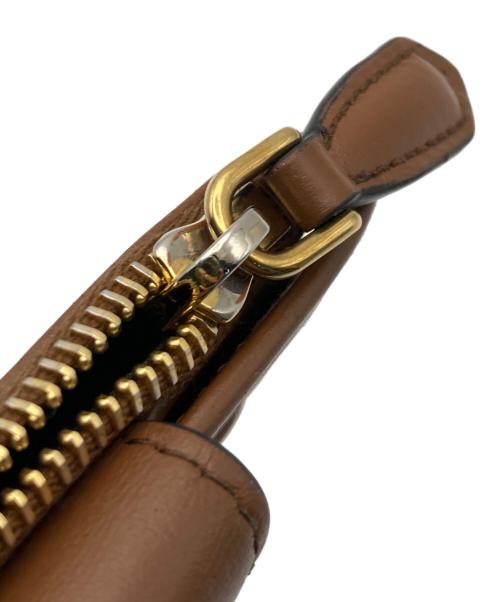 PRADA（プラダ）PRADA (プラダ) シティカーフコンパクトウォレット ブラウンの古着・服飾アイテム